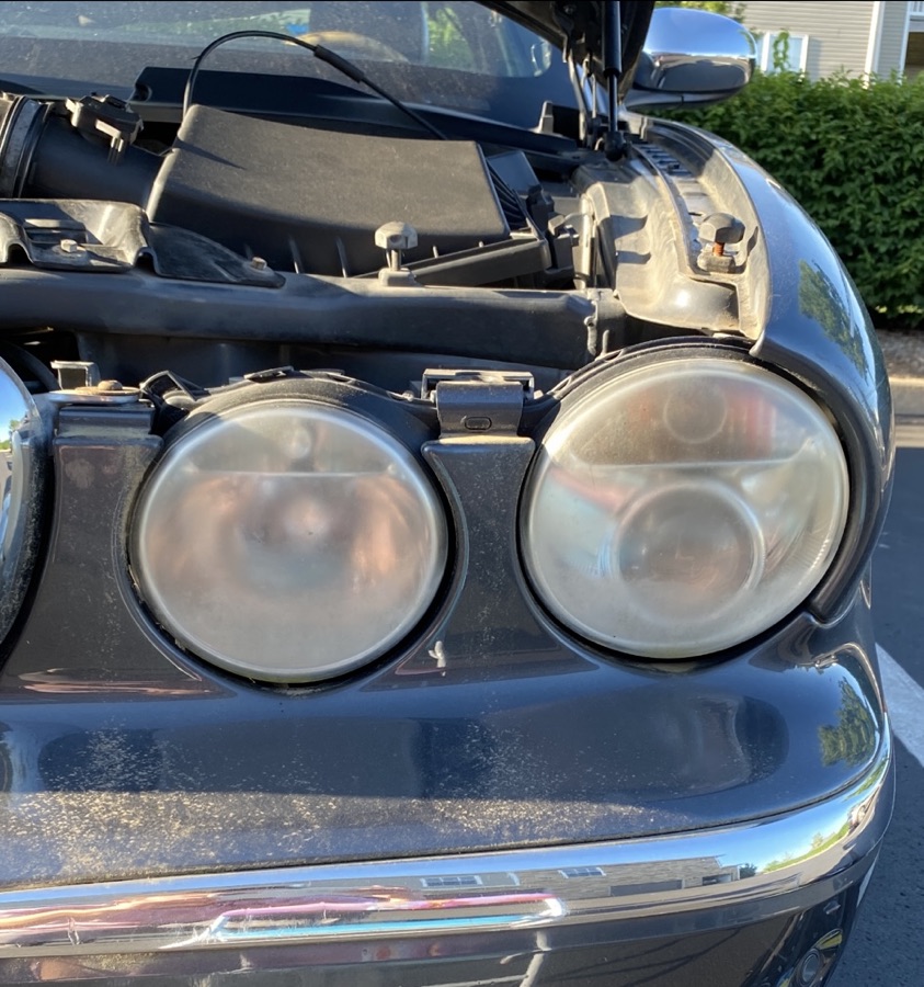 Jaguar headlight before restoration