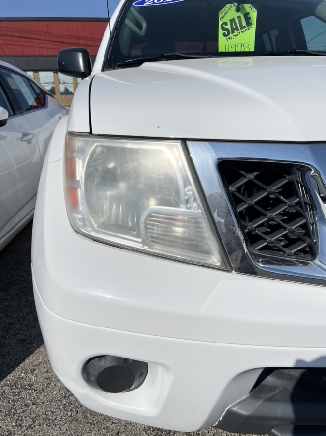 Nissan Frontier headlight before restoration